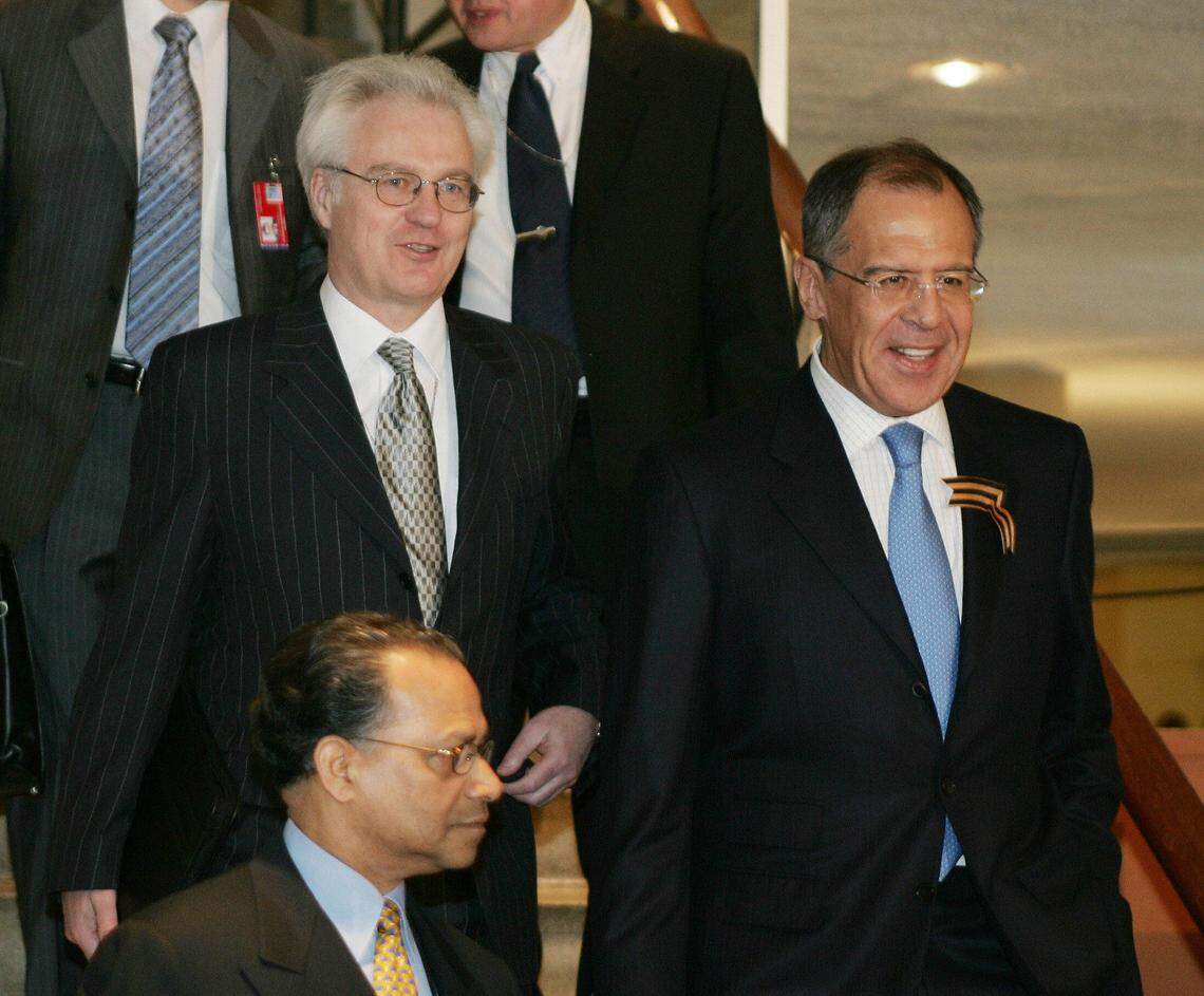 Russia's Foreign Minister Sergey Lavrov (R) and Ambassador to the UN Vitaly Churkin(L) arrive to attend a meeting on the Israel-Palestinian peace process 09 May, 2006 at the United Nations in New York. The "quartet" of diplomatic powers seeking Middle East peace are meeting with hopes of reviving its stalled efforts and unify its approach to the Palestinians' new militant leadership. Top diplomats of the United States, European Union, United Nations and Russia, which make up the quartet, will confer on the increasingly dim prospects for implementing their peace "roadmap" aimed at creation of a viable Palestinian state.  AFP PHOTO/DON EMMERT  (Photo credit should read DON EMMERT/AFP via Getty Images)