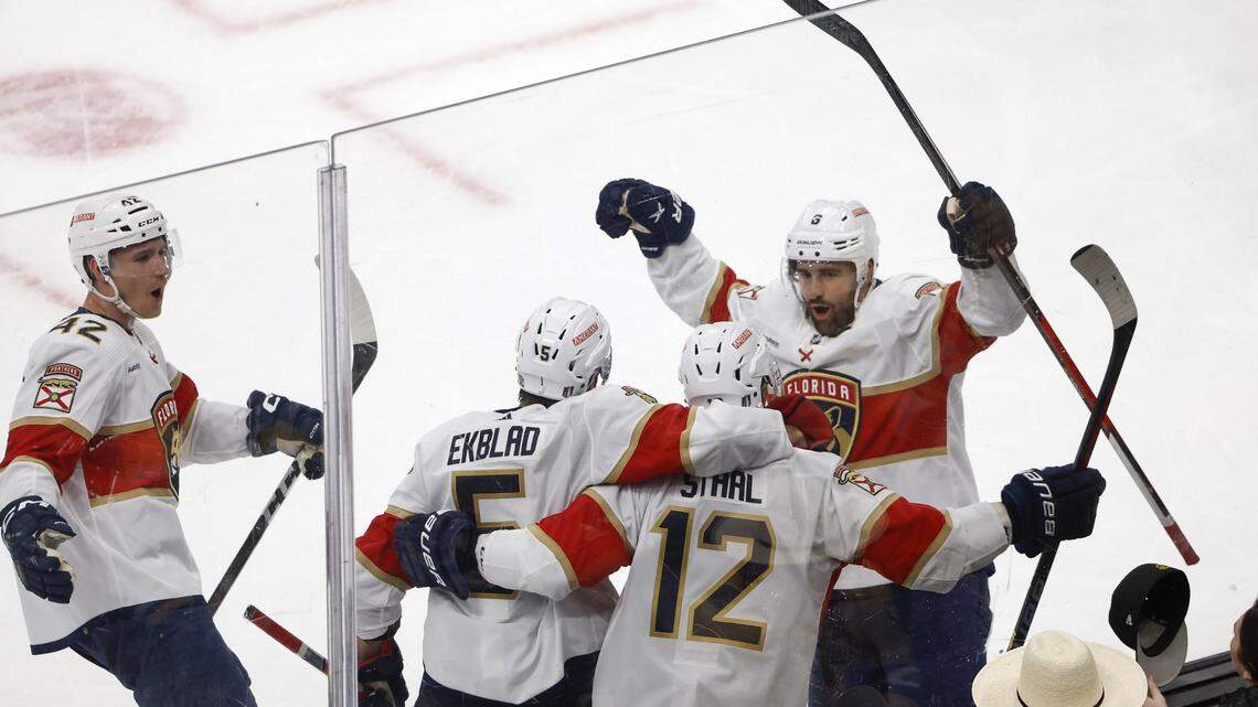 Apr 19, 2023; Boston, Massachusetts, USA; Florida Panthers center Eric Staal (12) is congratulated after his goal by center Colin White (6), defenseman Aaron Ekblad (5) and defenseman Gustav Forsling (42) during the second period of game two of the first round of the 2023 Stanley Cup Playoffs against the Boston Bruins at TD Garden. Mandatory Credit: Winslow Townson-USA TODAY Sports