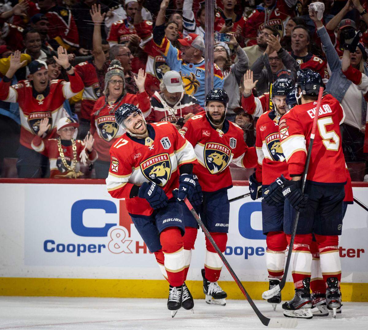 Sunrise, Florida, June 10, 2024 - Florida Panthers center Evan Rodrigues (17) skates away from teammates with a big smile on his face after scoring in the third period to make the score 2-1 in favor of the Florida Panthers.