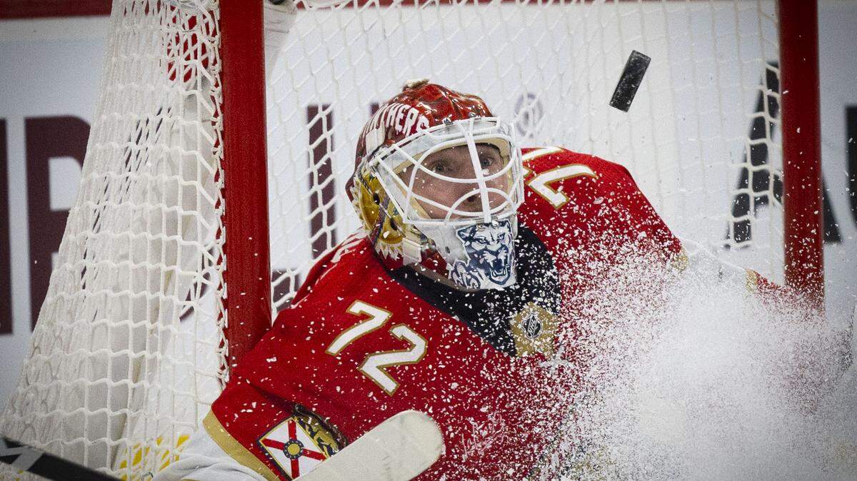 Florida Panthers goaltender Sergei Bobrovsky (72) looks up at a shot on goal during the first period of a hockey game on Thursday, Feb. 8, 2024, at Amerant Bank Arena in Sunrise, Fla.