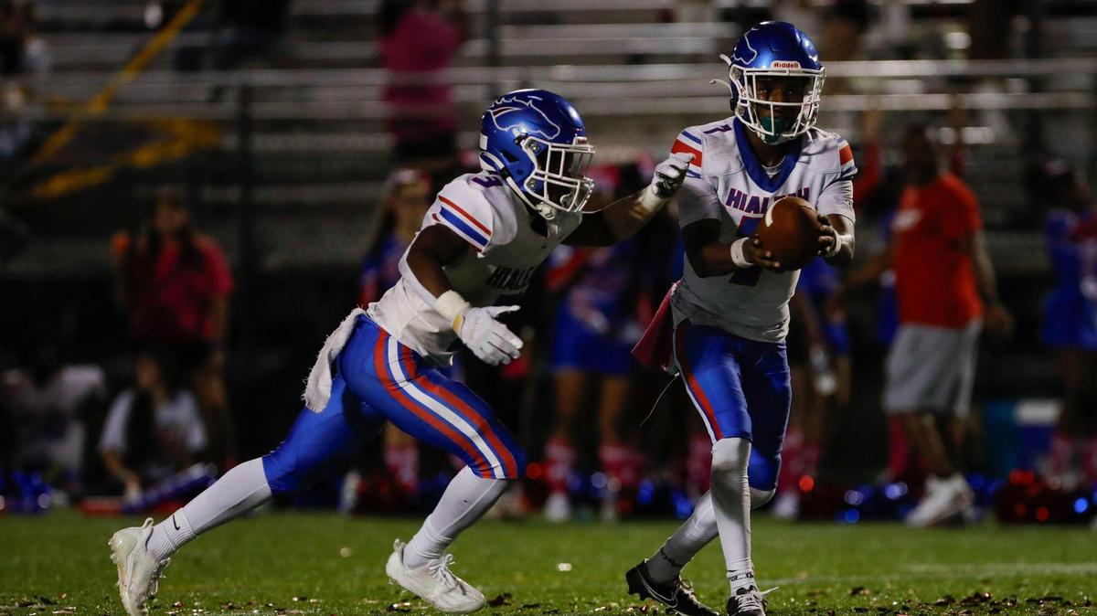Hialeah Thoroughbreds quarterback Travis Delaney Jr (7) passes the football to running back Ryan Mathis (3) during a game against North Miami on Wednesday, October 11, 2023. Mathis led a comeback win over Miami High on Friday, Oct. 20, 2023 at Milander Park.
