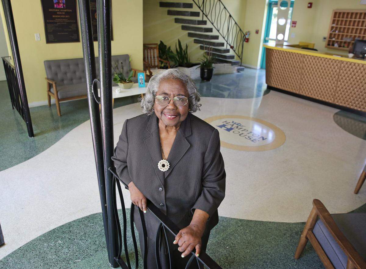 Historian and civil rights activist Enid Pinkney in the lobby of the historic Hampton House hotel in Brownsville, which she led the fight to save. Pinkney, a 1949 graduate of Booker T. Washington Junior Senior High School, was the first black president of Dade Heritage Trust.