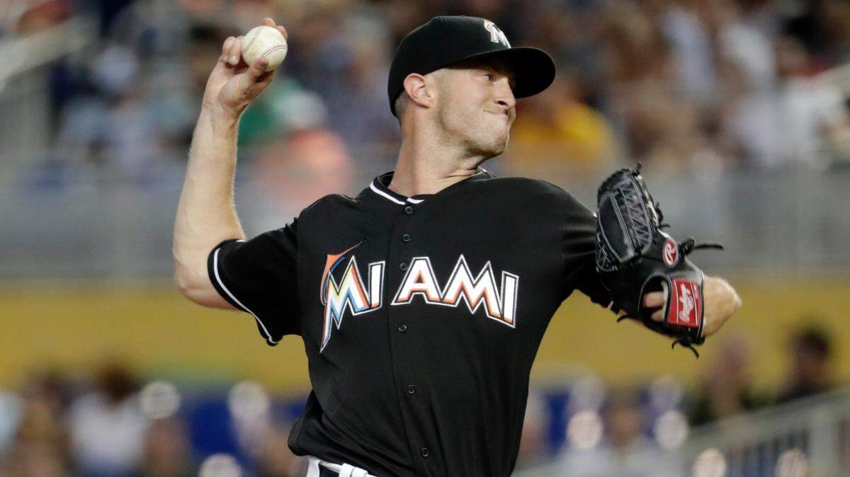 Miami Marlins starting pitcher Trevor Richards throws during the third inning of a baseball game against the Pittsburgh Pirates, Saturday, April 14, 2018, in Miami.