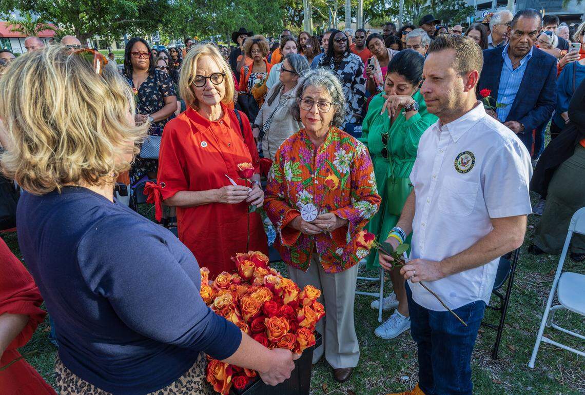 Elected officials from across South Florida including from left: Mayor Eileen Higgins, City of Miami; Mayor Daniella Levine Cava, Miami-Dade County; and Congressman Jared Moskowitz joined a large group of community members and the family of Coral Springs Vice Mayor Nancy Metayer Bowen, during a candlelight vigil celebrating her life, on Friday, April 3, at Coral Springs City Hall.