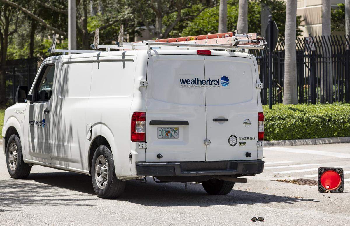 A white van is seen outside the ICE-ERO Center after a man was detained there on Tuesday, Aug. 26, 2025, in Miramar, Fla.