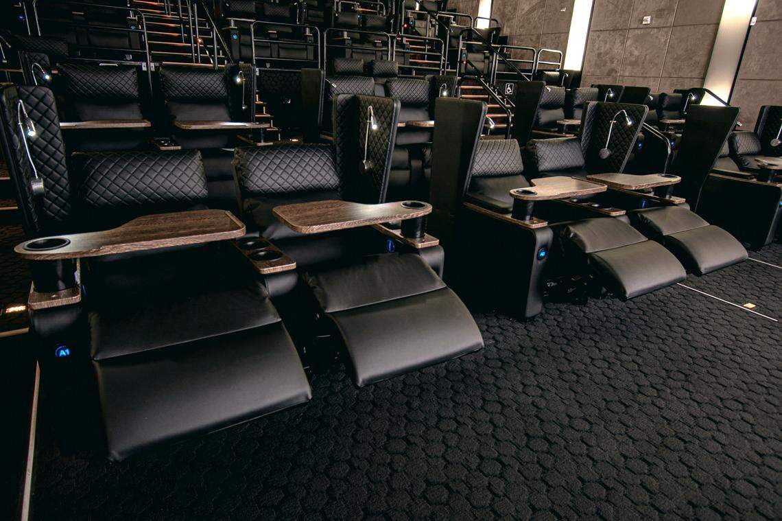 The luxury recliner seats at the CMX theater in Brickell City Centre are a signature of the company’s deluxe dine-in cinemas.