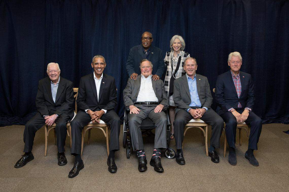 Sam Moore and wife Joyce Moore pose with their friends, former U.S. presidents George H.W. Bush and George W. Bush at the One America Appeal concert at Texas A&M University in College Station, Texas, on Oct. 21, 2017. Seated in the front row are presidents Jimmy Carter, Barack Obama,George H.W. Bush, George W. Bush and Bill Clinton. Moore has sung for all of these presidents.