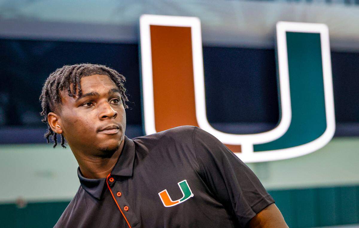 Miami Hurricanes quarterback Cam Ward (1) speaks to reporters at the University of Miami’s Carol Soffer Indoor Practice Facility on Tuesday, July 30, 2024.