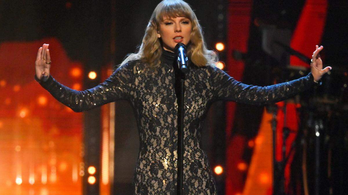 Taylor Swift performs during the Rock and Roll Hall of Fame Induction ceremony, Saturday, Oct. 30, 2021, in Cleveland.