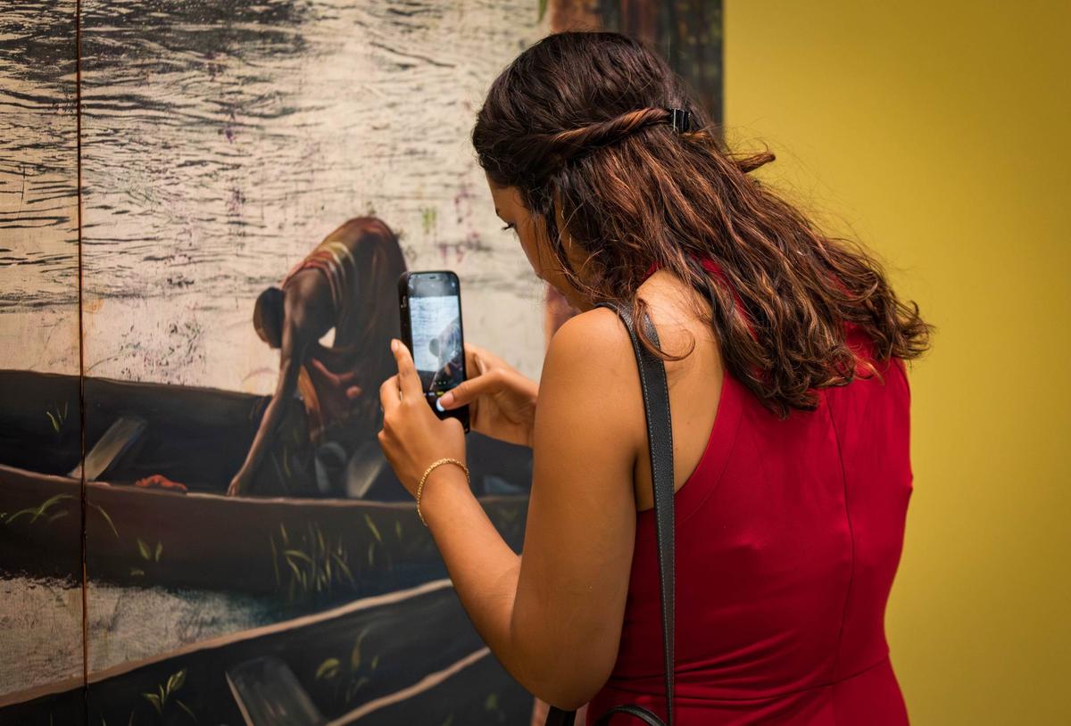 Friends, family and artists came to Cornelius Tulloch’s opening night party for his exhibit “Angisa: a language of living” at the Andrew Reed Gallery.