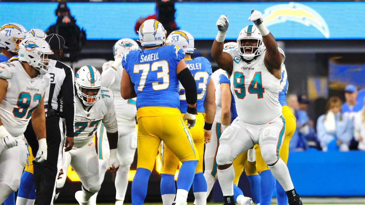 Miami Dolphins Christian Wilkins celebrates a sack  during the game between the Miami 
Dolphins against the Los Angeles Chargers at SoFi Stadium in Inglewood, California on December 11, 2022.