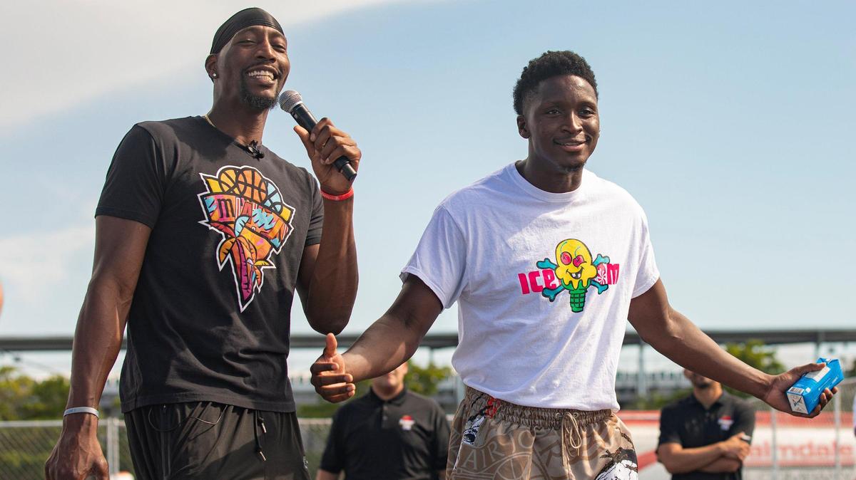 Miami Heat players Bam Adebayo (left) and Victor Oladipo answer questions from Afterschool Allstars participants in a one-hour clinic of guided instruction on dribbling and passing, strength and conditioning, and shooting form in partnership with Rolling Loud at Hard Rock Stadium in Miami Gardens on Thursday, July 21, 2022.