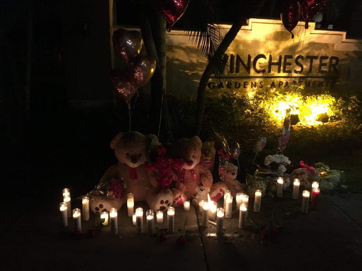 A memorial near the site where Jeanette Berrios was killed early Saturday morning, as she was walking home from her job at Burger King in Homestead. She was killed in a hit-and-run crash outside of the Winchester Apartments, where she lived, 16440 SW 304th St.