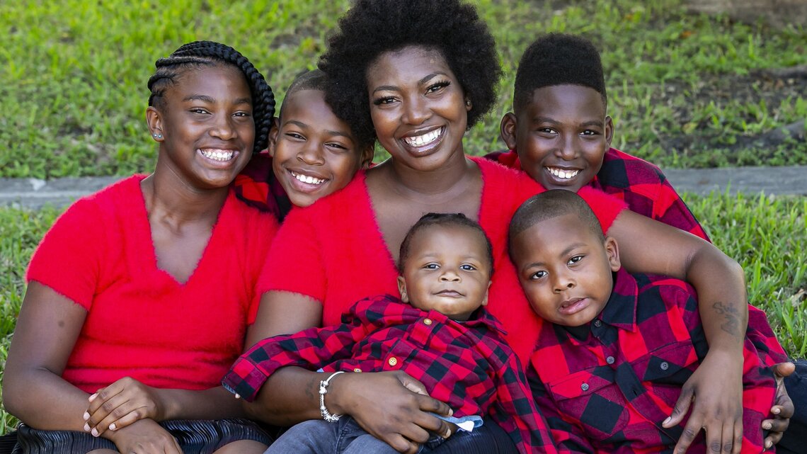 Though money is tight, single mom who adopts 2 more kids is rich in love