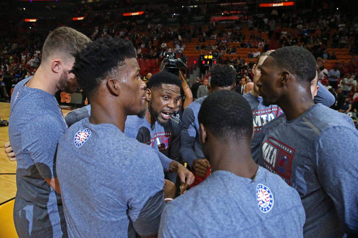Miami Heat forward Udonis Haslem (40) huddle with teammates before the start of an NBA basketball regular season game against the Detroit Pistons at the AmericanAirlines Arena on Tuesday, November 12, 2019 in Miami.
