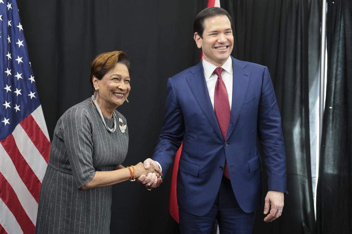 U.S. Secretary of State Marco Rubio shakes hands with Trinidad and Tobago's Prime Minister Kamla Persad-Bissessar during meetings with Caribbean Community (CARICOM) leaders, in Basseterre, Saint Kitts and Nevis, on Feb. 25, 2026. 