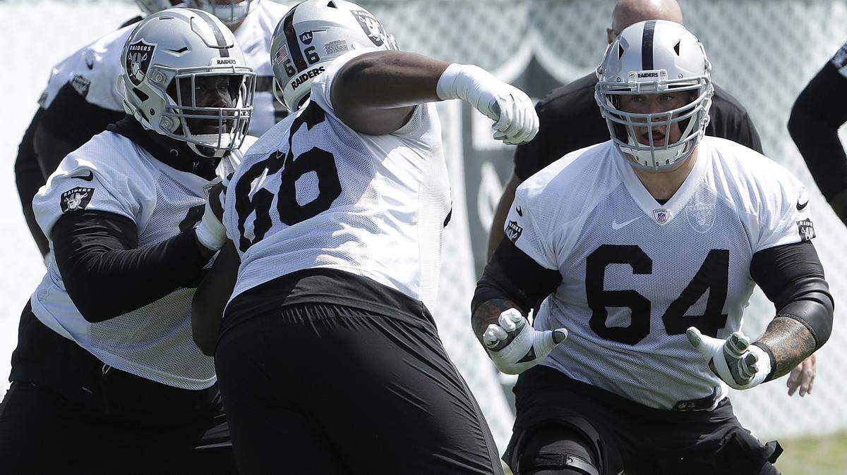 Offensive lineman Richie Incognito, 64, practices with his new Raiders teammates in late May. Incognito, the former Dolphins guard and villain of the team’s bullying scandal, is back in the NFL after his second one-year absence.