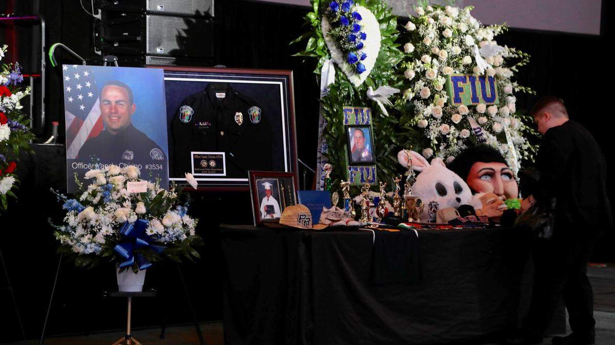 Personal items including athletic trophies and the uniform of slain Hollywood Police Officer Yandy Chirino were on display at FLA Live Arena (formerly BB&T Center) in Sunrise before his funeral service on Nov. 1, 2021. Chirino was killed during a late-night altercation on Sunday, Oct. 17, with a teenage suspect.