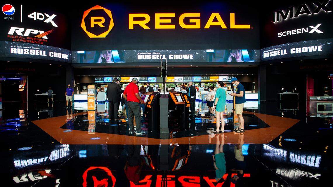 Masked moviegoers buy their movie tickets at ticket kiosks at Regal Pinnacle in Turkey Creek on Friday, August 21, 2020. Knoxville-based Regal Cinemas reopened its theaters on Friday.

Kns Regal Reopens Bp
