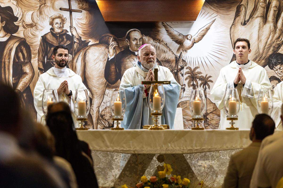 Archbishop Thomas Wenski celebrates mass with congregants during the annual celebration of the feast day of Cuba's patroness, Our Lady of Charity, at Ermita de la Caridad, also known as National Shrine of Our Lady of Charity, on Monday, September 8, 2025, in Coconut Grove, Fla.