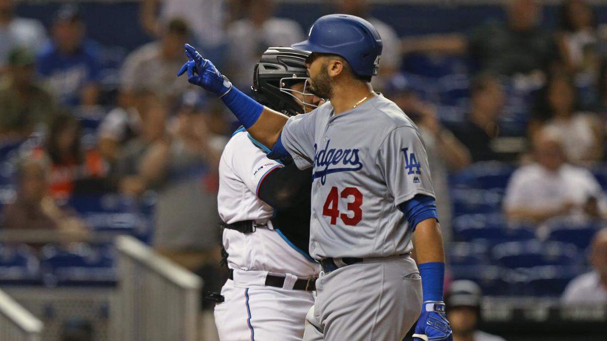 Los Angeles Dodgers first baseman Edwin Rios (43) reacts after hitting solo home run against the Miami Marlins at Marlins Park in Miami on Wednesday, Aug. 14. Rios is a former FIU Panthers baseball player.