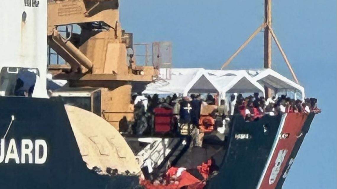 Hundreds of Cuban migrants line the deck aboard a U.S. Coast Guard buoy tender cutter as it approaches the Coast Guard Sector Key West on Thursday, Jan. 5, 2022. In total, 337 migrants who had landed at Dry Tortugas National Park were shipped by the Coast Guard to Key West on Thursday. From there, they will be transported to U.S. Border Patrol for processing, the Coast Guard said.