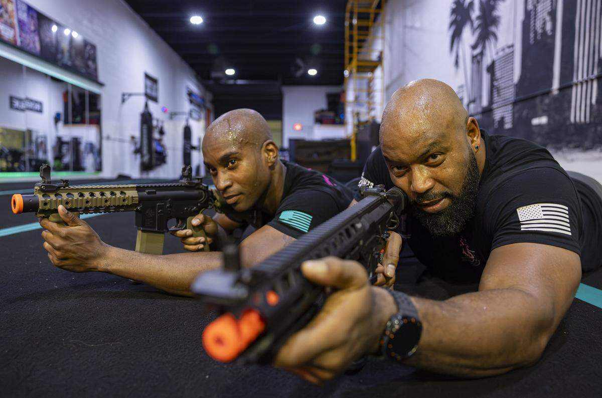 Ekandem Essiet, 41, left, and Chris Henderson, 48, run drills during a training session at their gym on Tuesday, Aug. 12, 2025, in Miami, Fla. Miami Action Design is the first stunt gym in Miami-Dade County and offers classes that teach members how to become stunt performers for movies and television.