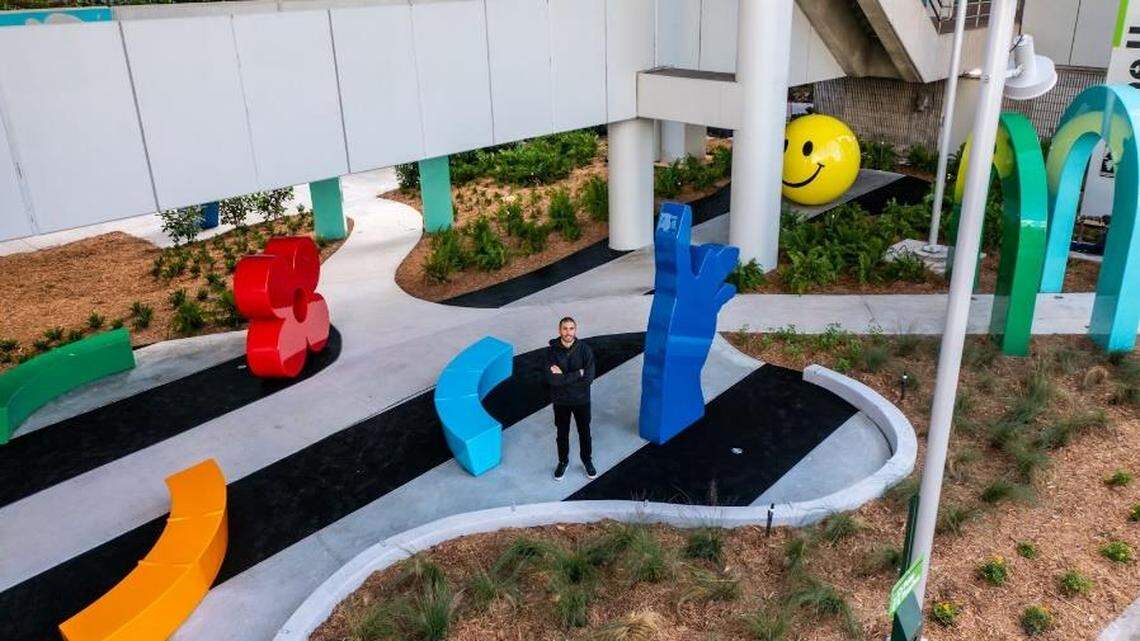 Miami multimedia artist Typoe stands in the new sculpture garden he created underneath a Metromover station for The Underline’s Brickell Backyard section, the first to open. The sculptures made their debut in November.