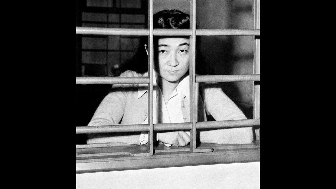 Iva Ikuko Toguri D’Aquino, unfairly dubbed “Tokyo Rose,” looks out the bars of her cell during a 1945 investigation that later cleared her of being the infamous Japanese propagandist, who never actually existed. Despite this, Aquino was later convicted of treason in 1949 and spent six years in prison.