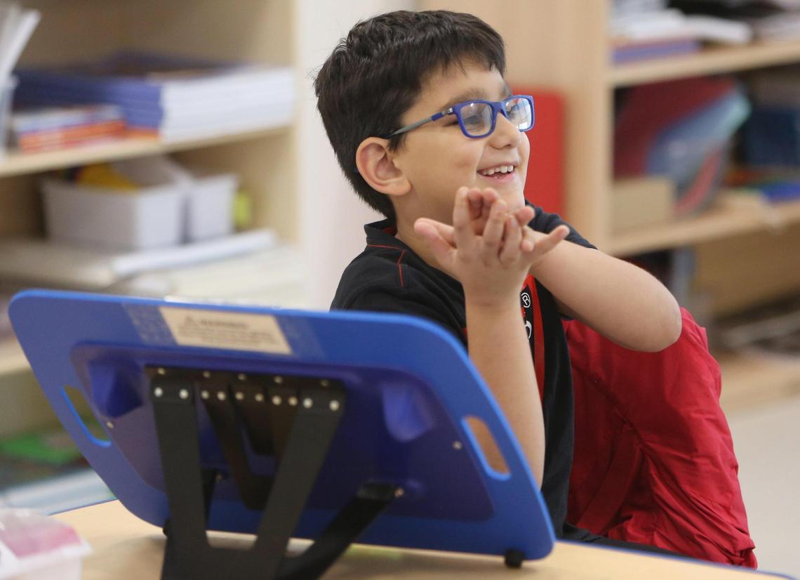 Miami Lighthouse for the Blind and Visually Impaired second-grade student, Lorenzo, sings a song in his classroom on Dec. 6, 2021. Lorenzo is a student who is part of a new initiative Miami Lighthouse is using to help kids diagnosed with CVI, the No. 1 cause of bilateral visual impairment in children in the developed world.