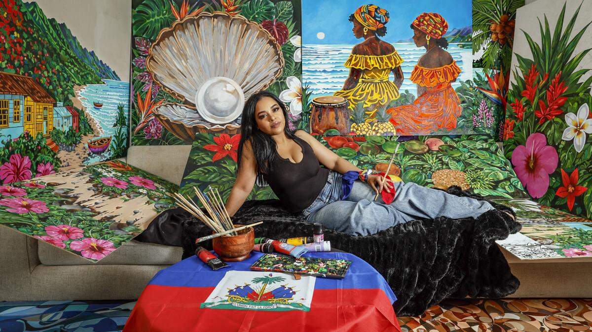 Haitian artist Laurenee Gauvin at her home studio in Hallandale Beach, Florida, on Friday, May 29, 2026. 
Gauvin, like others hoping to represent in an authentic Haiti soccer jersey, has spent the past week scouring the internet only to learn from the official manufacturer, Colombia-based Saeta, that they are out of stock on her size. “I'm going to the Haiti-Brazil game in Philly, so I need to represent,” she says of the June 19 match in Philadelphia. 