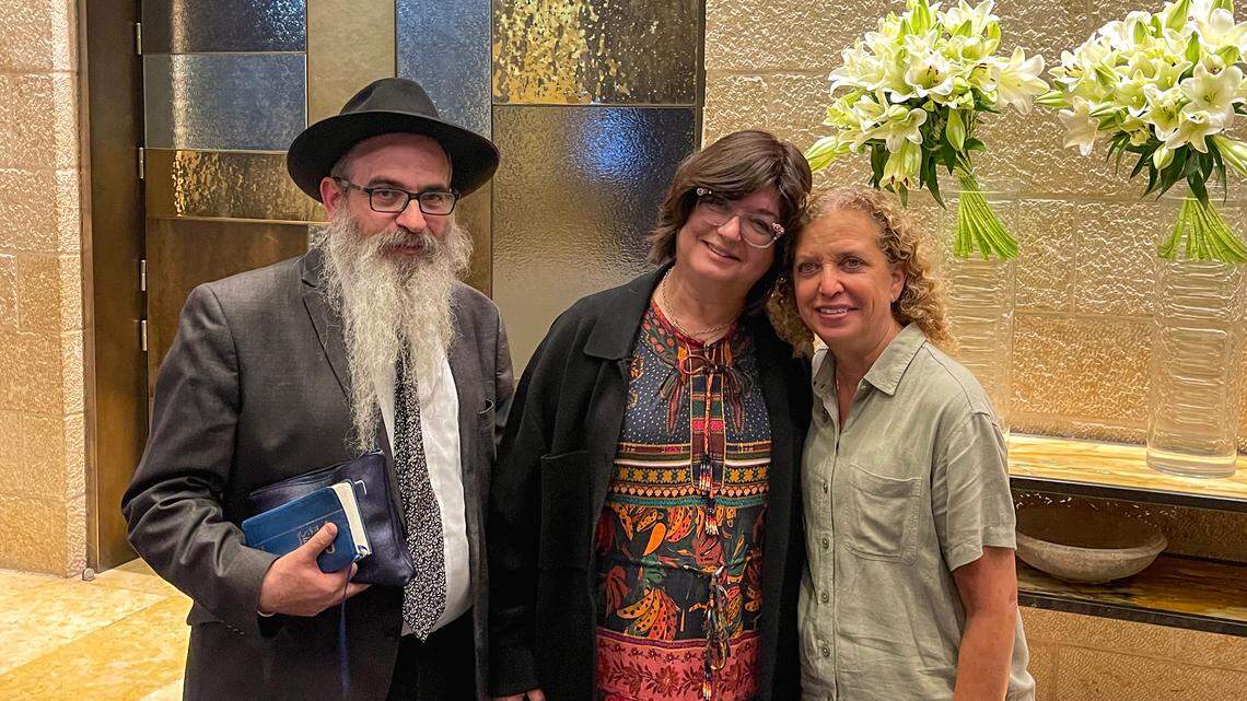 Rabbi Raphael Tennenhaus, left, his wife Goldie, center, and U.S. Rep. Debbie Wasserman-Schultz, right, in Jerusalem Tuesday, Oct. 10, 2023. Tennenhaus led a gathering of U.S. government delegates in a prayer for peace. Tennenhaus is the rabbi of the Chabad of South Broward in Hallandale Beach and was in Jerusalem when Hamas militants attacked Israel Saturday.