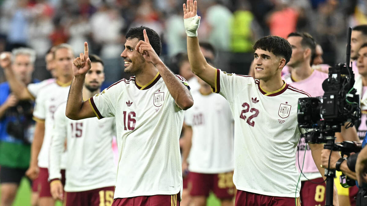 Spain's midfielder #16 Rodri and defender #22 Pau Cubarsi celebrate after their team won the 2026 World Cup football tournament semi-final match between France and Spain at the Dallas Stadium in Arlington on July 14, 2026.  (Photo by Paul ELLIS / AFP via Getty Images)