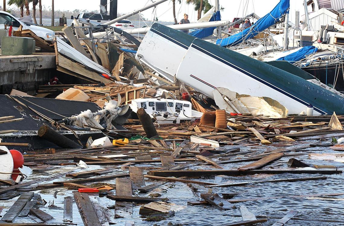 Wrecked boats floated at Panama City’s city marina on Thursday.