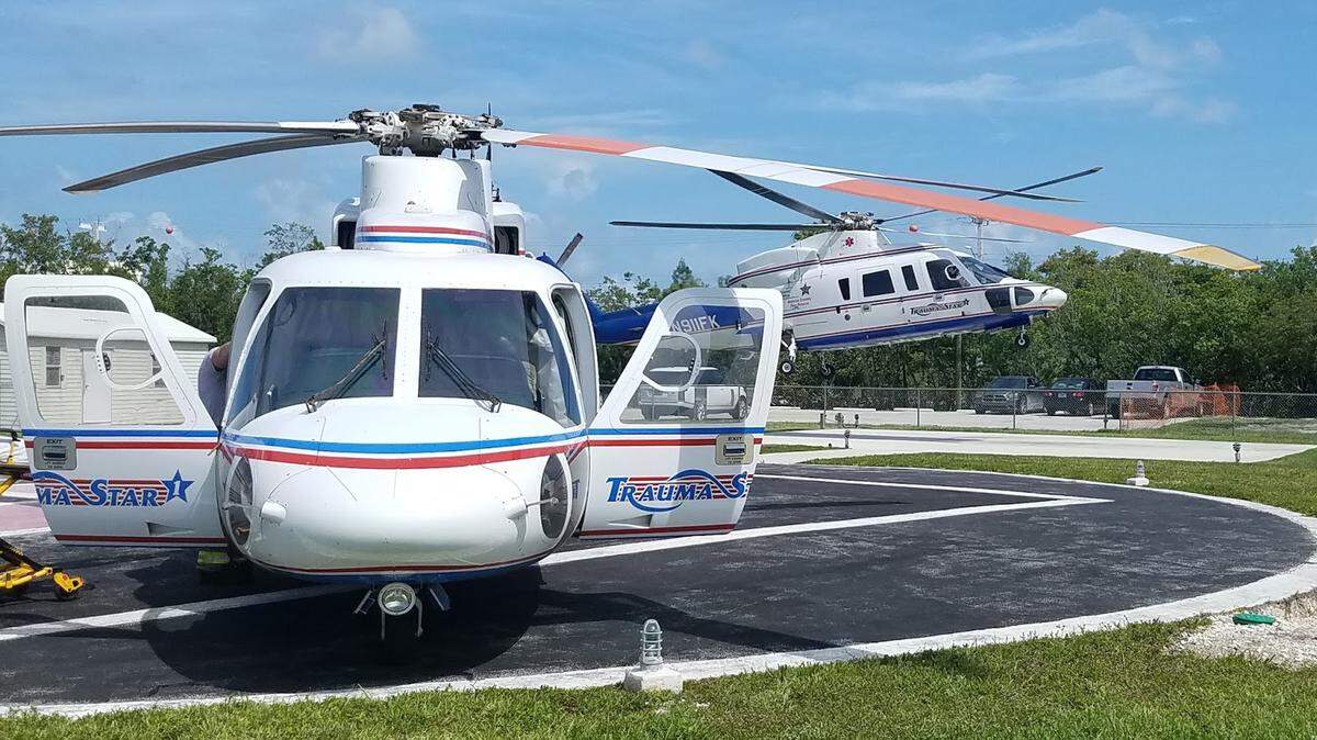 A Trauma Star helicopter was used to help save a Seattle woman found in the waters off the Keys after snorkeling on April 7, 2022. She later died.