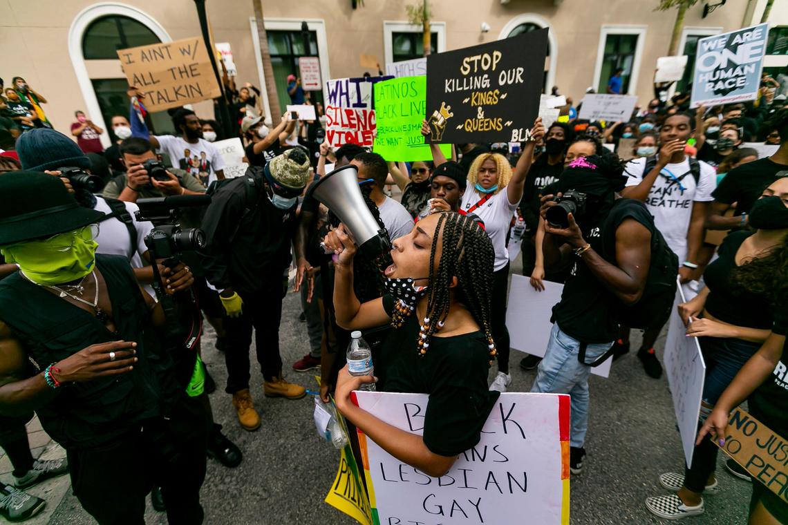 Activists rally through the Miramar Town Center as they participate in a Justice for George Floyd rally in Miramar, Florida on Saturday, June 6, 2020. Hundreds of protestors took to the street Saturday protesting against police brutality and the death of George Floyd in Minneapolis.