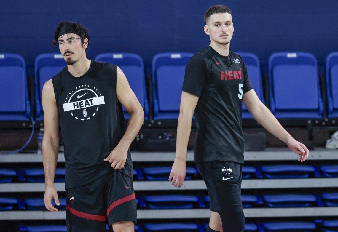 Miami Heat forward Nikola Jovic (5) on the court with Miami Heat guard Jaime Jaquez Jr. (11) during training camp at Abessino Court at Eleanor R. Baldwin Arena at Florida Atlantic University in Boca Raton on October 2, 2025.