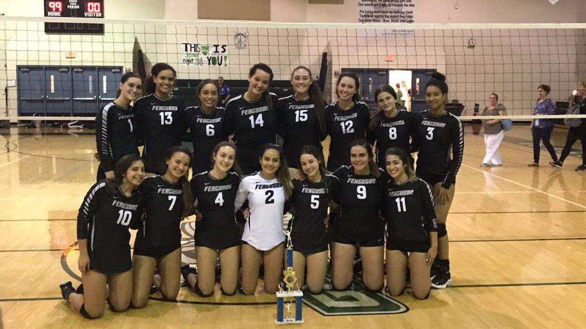 The Ferguson girls’ volleyball team poses after winning the GMAC volleyball championship.