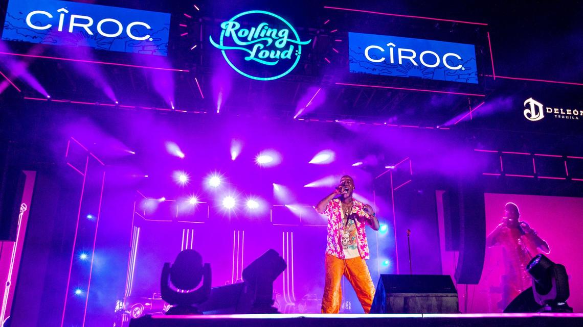 Fans boo Kid Cudi off the stage at Rolling Loud. Meanwhile, Kanye West shows up next door