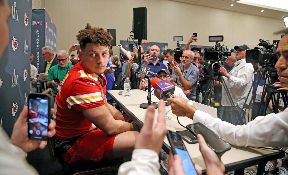 Kansas City Chiefs quarterback Patrick Mahomes is interviewed by the media as they prepare to play the San Francisco 49ers in Super Bowl LVI, Aventura, Florida , January 28, 2020.