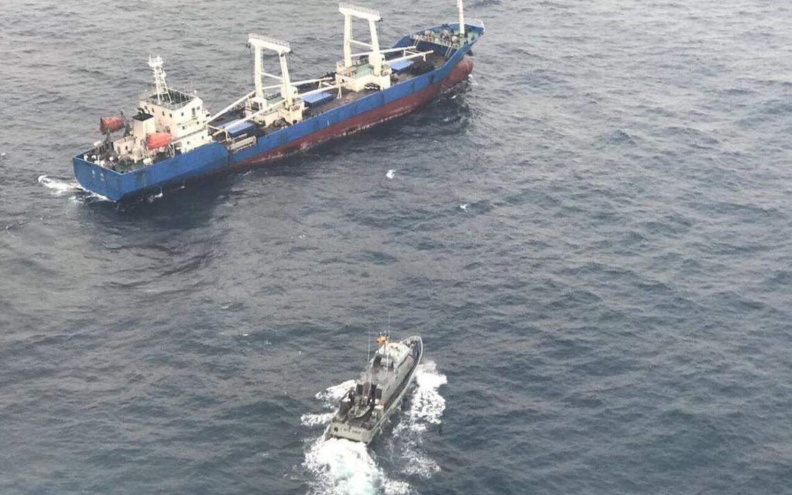 Ecuador’s patrol vessel bares down on the Fu Yuan Yu Leng 999, a fish carrier vessel loaded with illegal and endangered sharks.
