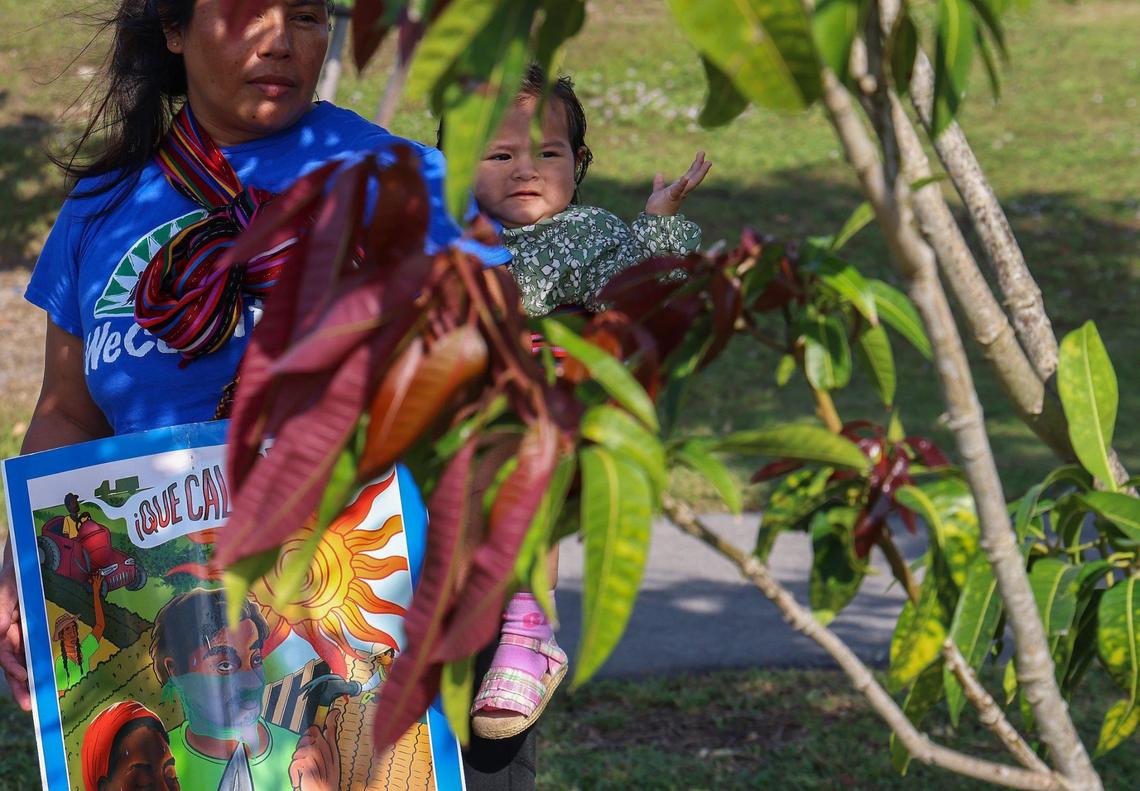 Martha Julia Gabriel, 42, finds some shade at the launching of Miami-Dade County’s Extreme Heat Action Plan, with her daughter, Yulitza Morales, 1, along with fellow members of We Count!, membership-led organization of low-wage immigrant workers and families. On Wednesday morning, December 14, 2022 Miami-Dade County Mayor Daniella Levine Cava, together with the Miami Foundation, launched Miami-Dade County’s Extreme Heat Action Plan, a blueprint to reduce the health and economic impacts of increasing extreme heat, and create a baseline for further research and new partnerships around this issue at Amelia Earhart Park in Hialeah, Florida.