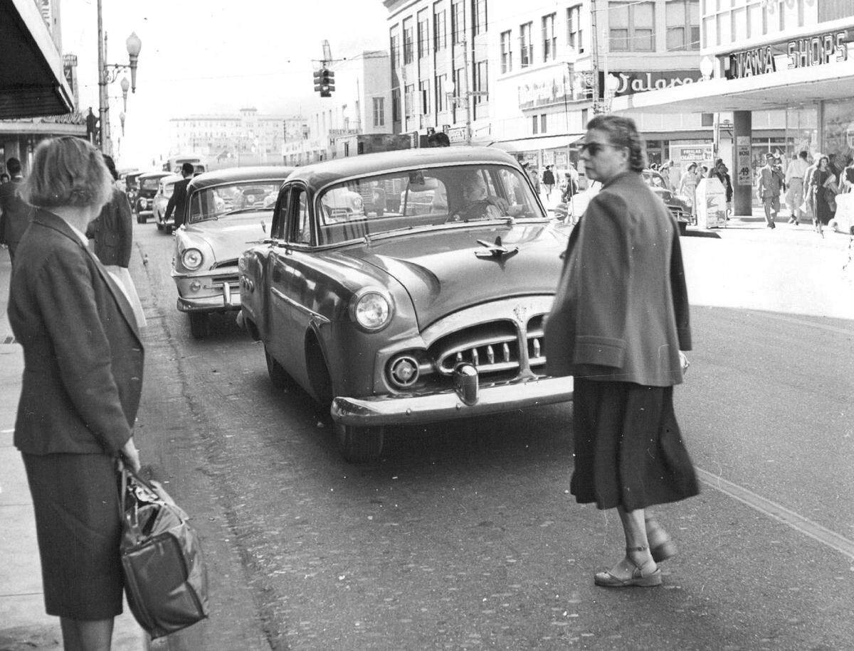 Jay walkers on Flagler Street in 1954.