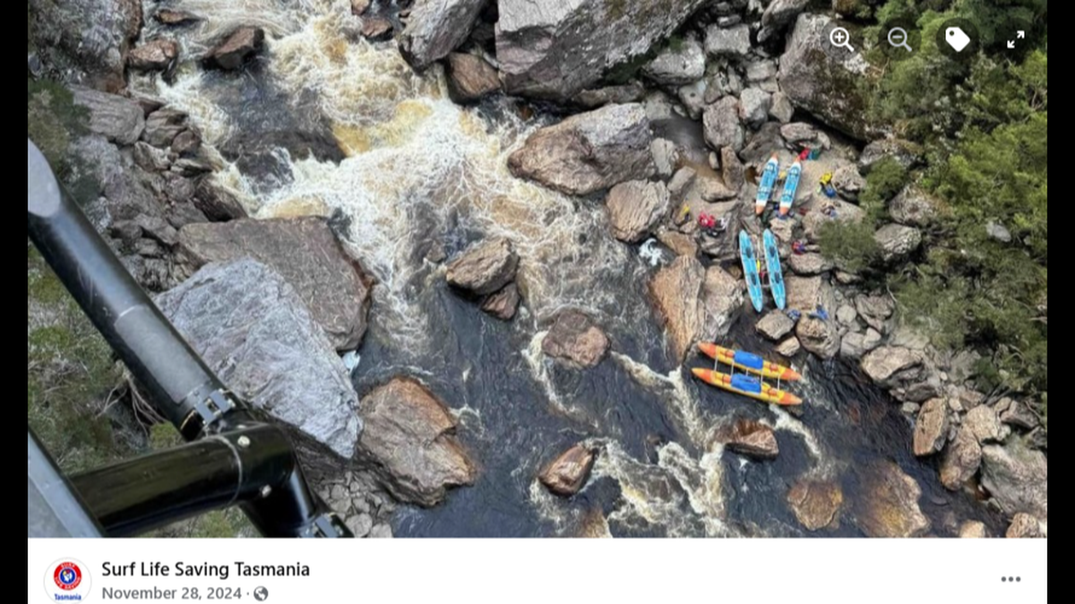 An experienced kayaker from Lithuania slipped and rocks and became stuck during an Australia rafting trip, rescuers said.