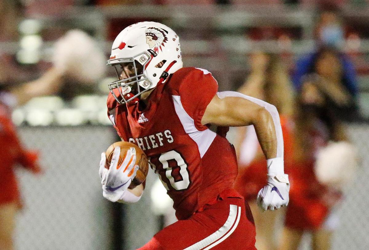 Cardinal Gibbons Chiefs’ wide receiver Troy Stellato (10) runs for a touchdown against Clewiston Tigers during the FHSAA 4A football regional quarterfinal game on Friday, November 13, 2020 at Cardinal Gibbons High School