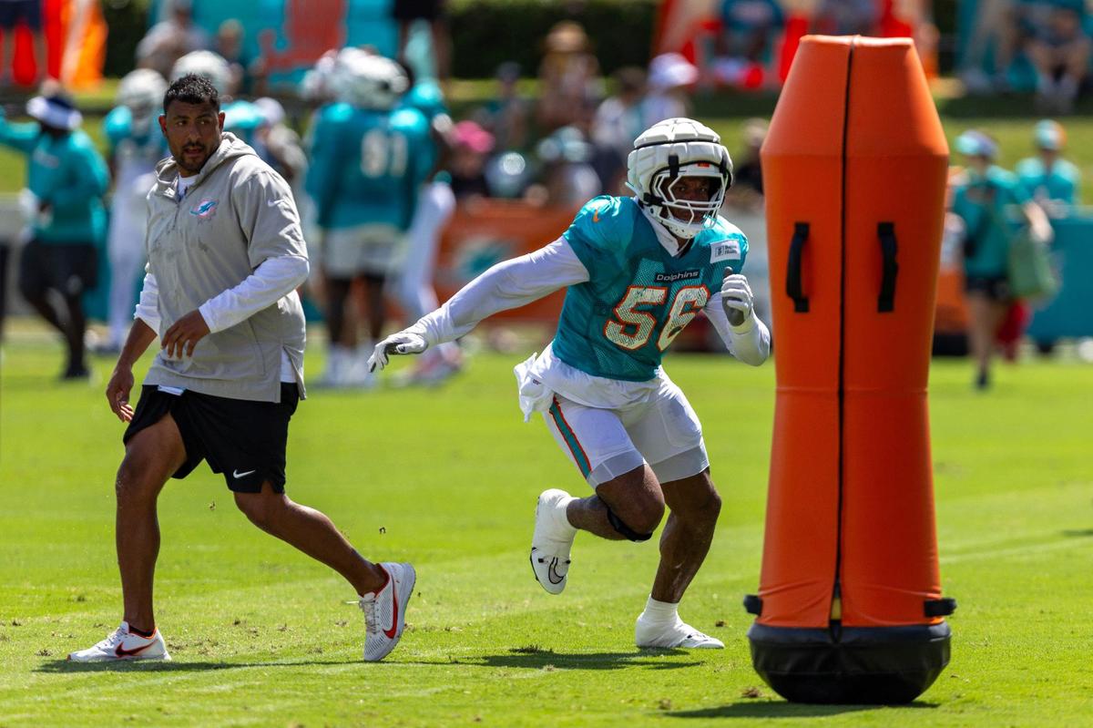 Miami Dolphins linebacker Quinton Bell (56) runs through a drill during Day 6 of training camp at Baptist Health Training Complex on Tuesday, July 30, 2024, in Miami Gardens, Fla.