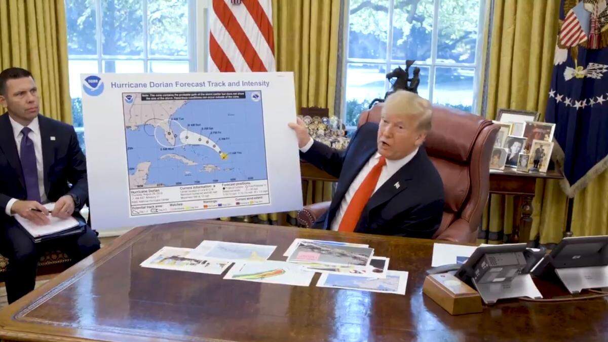 President Donald Trump on Wednesday held a map that seemed to be altered.