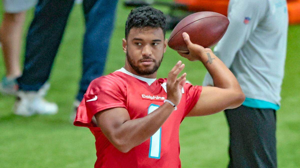 Miami Dolphins quarterback Tua Tagovailoa (1) throws a pass during practice drills at Baptist Health Training Complex in Miami Gardens on Friday, September 23, 2022.