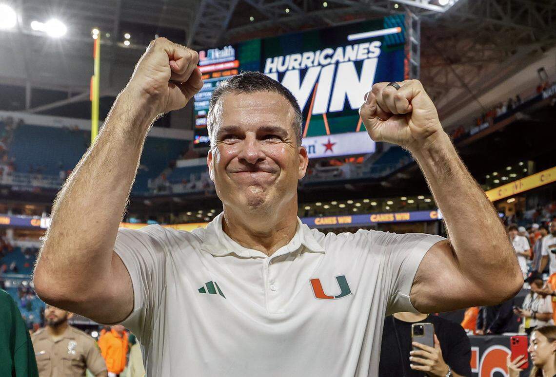 Miami Hurricanes head coach Mario Cristobal pumps his fists in victory after the Canes defeat the Florida Gators during their NCAA football game at Hard Rock Stadium in Miami Gardens, Florida, on Saturday, September 20, 2025.
