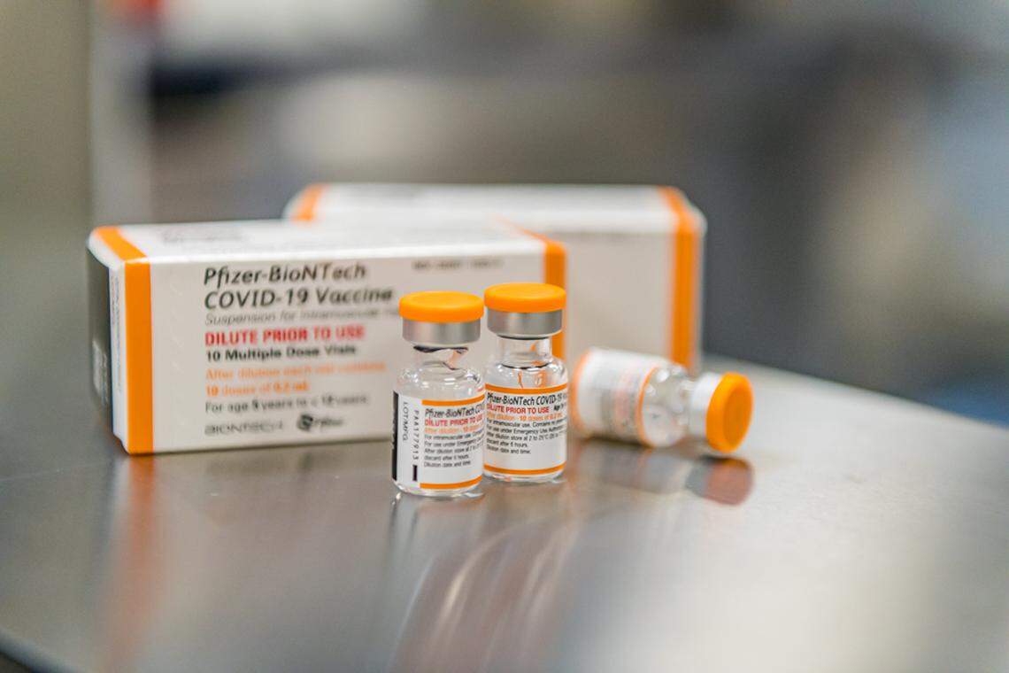Pfizer’s COVID-19 vaccine for kids ages 5 to 11 comes in a vial with an orange label and lid. The vaccine for people 12 and older is in a vial with a purple label and lid.